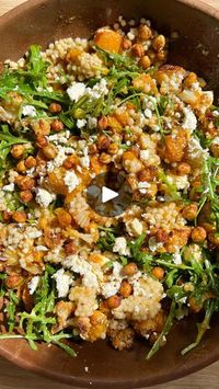 95K views · 8.3K reactions | crispy chickpea, roasted cauliflower and pumpkin salad ✨  My favourite way to eat roasted veggies is in salads and this one is absolutely loaded with all the goods!! It has so many delicious flavours and textures, and makes for a fabulous light meal or side dish 🤤  INGREDIENTS  Rocket  Feta   Roasted cauliflower and pumpkin: 1/4 of a small pumpkin  1/2 of a small cauliflower  Drizzle of olive oil Salt Garlic powder  Onion powder  Paprika   — Bake at 200°c for 35-40 mins or until golden brown  Crispy chickpeas: 1 can of chickpeas (rinsed/drained)  Drizzle of olive oil Salt Garlic powder  Onion powder  Paprika   — Bake at 200°c for 25-30 minutes or until crispy.   Cous cous  1 cup pearl couscous  1 cup vegetable stock  — Cook as per directions   Dressing: 3tbsp