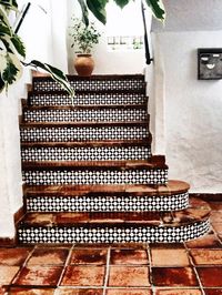 If you're looking to add #Mediterranean flair to your home, but you're afraid of going too colorful, you can't go wrong with black and white. The tile accents on this #staircase are whimsical enough to be interesting, yet simple enough to blend seamlessly with the rest of the space.  #DIY