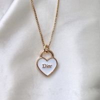 Dior gold heart pendant necklace on a gold filled chain. Perfect gift for Valentine's Day or everyday!