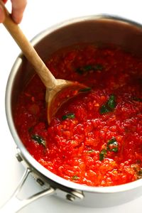 This Spicy Arrabbiata Sauce recipe is a classic Italian marinara made simply with canned tomatoes, garlic, onion, basil, olive oil (or butter), and a generous spoonful of crushed red pepper flakes -- and it is DELICIOUS. Perfect for pasta, gnocchi, pizza, subs or using as a dipping sauce. | gimmesomeoven.com #italian #marinara #tomato #sauce #spicy #pasta #dinner #dipping #healthy