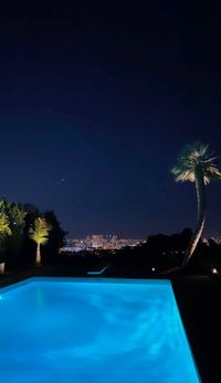 pool overlooking city lights