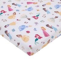 The Disney Princess Fitted Mini Crib Sheet features an enchanting allover pattern with many pretty Princesses. Includes Princess Cinderella, Ariel, Belle, Arora, Tiana, Jasmine, and Snow White. Your little one will sleep soundly on this mini crib sheet's cozy surface, comes in lovely shades of pink, light blue, yellow and white. Measures 24 x 38" x 5" and includes full elastic for a safe and snug fit and fits a standard size mini crib mattress. Coordinates nicely with most decor and perfect for your magical princess  Pretty Princesses are enchanting on this adorable Disney Fitted Mini Crib Sheet!  Designed in beautiful shades of pink, light blue, yellow and white  The fitted mini crib sheet includes full elastic edges for a safe and snug fit  Measures 24in x 38in x 5in and fits a standard