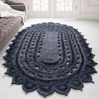 Breezy style meets a boho vibe in this vintage-inspired area rug. Made from a blend of jute and sisal, it showcases a round or oval shape with a spiral motif and a lace-like edge for an antiqued feel. A navy colour scheme makes it just right for your sunroom or office. With a pile height of 0.38", this rug adds a layer of comfort to your medium to low traffic rooms. Best of all, this rug is safe to place on heated floors. We recommend adding a non-slip rug pad underneath to keep it in place. Lan