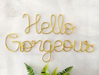 "Hello Gorgeous! A cheerful wire word sign to brighten your day. Hang on a wall in any room including; a bedroom, nursery, kid's room, bathroom, office, living room, entryway, dorm and more! This is our \"original\" font that is unique to only Emini Creations as it is based off of our personal handwriting. ------------------------------------------------------ Details: *Size Options from top of letter to the bottom of letter (see photos): Small - Hello 3\"H x 9.5\"L, Gorgeous 5\"H x 15\"L Medium