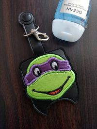 Check out this item in my Etsy shop https://www.etsy.com/listing/1117694574/tmnt-turtle-hero-sanitizer-holder-case