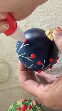 I’ve found the easiest way to make 3D textured holly berries on my hand painted ornaments is to find my inner baker and get out a good ol’ piping bag. I mix the paint with modeling paste and then just pipe on little berry dots. After they’ve dried overnight I will add the leaves! Let me know if you give it a try.