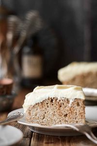 Fluffy spice cake is soaked with coffee, then topped with luxurious vanilla bean Bavarian cream. The cake is moist, soft and full of warm, cozy flavors reminiscent of tiramisu.  This high altitude Bavarian cream spice cake is a uniquely delicious dessert for a special occasion!