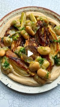 Beth Adamson on Instagram: "Fennel & butter beans. My top recipe of the year! Beautifully caramelised fennel propped up on a silky bed of butter beans. Thanks so much for all of the love and support this year, so happy to have you here 🥹

Recipe
Makes 2 portions
2 medium fennel, each cut lengthways into 6-8 wedges, with the herb/ frond finely chopped
700g jar butter beans, not drained 
2 shallots, finely chopped 
2 cloves garlic, finely chopped 
1 tsp fennel seeds
1 tsp picked thyme leaves
A good knob of butter
A little lemon zest and a good squeeze of juice 
Olive oil 
Salt & pepper 

1. Sweat the shallots in a little oil in a medium pan until softened. Stir in the garlic and fennel seeds. Cook out for 2-3 mins then stir in the beans. Keep stirring until the beans are very tender, add wa