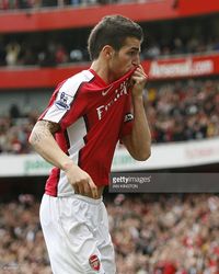 Arsenal's Spanish Cesc Fabregas celebrates scoring his goal against Blackburn Rovers during a Premier League match at the Emirates Stadium in London, on October 4, 2009. AFP PHOTO/IAN KINGTON FOR EDITORIAL USE ONLY Additional licence required for any commercial/promotional use or use on TV or internet (except identical online version of newspaper) of Premier League/Football League photos. Tel DataCo +44 207 2981656. Do not alter/modify photo.