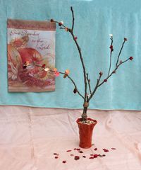 I hot glued metallic confetti onto branches to make a cute fall tree.