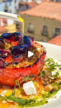 ‎Udi Barkan - Chef | Nutritionist | Recipes - אודי ברקן‎ on Instagram‎: "ROASTED VEGAN STUFFED PEPPERS 🌶️🍅

The ultimate comfort dish and my childhood favourite! 
Packed with juicy tomatoes, herbs, walnuts, and fragrant spices, these stuffed peppers will fill your kitchen with irresistible aromas. 

עברית בתגובות

Ingredients:
6 colorful bell peppers 🌈

For the Filling:
🍅 3 large tomatoes, grated
🍅 200 g tomato paste
🧅 1 diced onion
🌱 3 green onions, chopped
🌿 1 cup fresh dill, chopped
🥜 1 cup (200 g) walnuts, chopped
🧂 2 tsp salt
🍬 2 tbsp sugar
🌶️ 1 tsp red chili flakes
🍂 1 tsp cinnamon
🫒 1/4 cup olive oil
🍚 1 1/3 cups basmati rice

For the Sauce:
💧 1 cup (250 ml) water

For serving:
Greek yogurt
Feta cheese
Walnuts
Herbs
Olive oil

Instructions:
🔥 Preheat oven to 220°C (