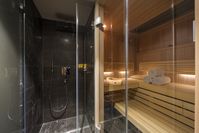 Chalet Apartment Agate has a private cave which has a sauna and shower area perfect for soothing aching muscles after a hard day on the slopes.