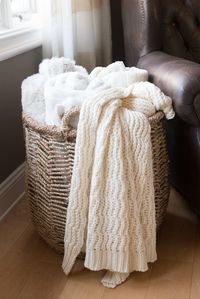 @homegoods basket filled with cozy throw blankets. #HelloGorgeous