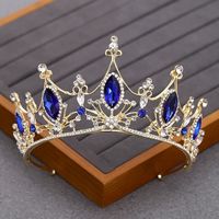 Blue sapphire Crystal Bridal Tiara Crown Detail Princess Queen headdress diadem This stunning Tiara Crown is crafted from tarnish resistant zinc alloy and intricately decorated with crystals to create an elegant look ideal for any special occasion, including weddings, quinceañeras, birthdays, pageants and more. Delight the Queen of your world and tell them they're your one and only! 🤩 Include a personal touch with our gift wrapping option that includes a hand written card! *GIFT WRAPPING AVAILA