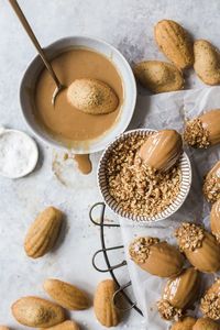 Nov 6, 2019 - Browned Butter Espresso Madeleines are the perfect treat for afternoon tea. Dipped in espresso glaze and then chopped walnuts, this nutty sponge.