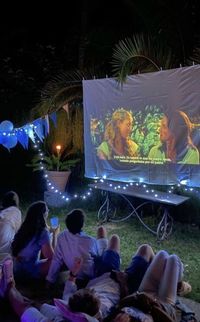 cute fun friend party idea hanging out, movie night, projector in backyard, easy and fun,