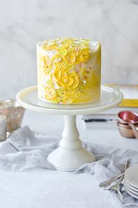 Hummingbird cake with beautiful painted buttercream in a floral design that's perfect for Easter or Mother's Day!