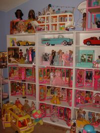 I like this display shelf set up because it has room for Barbie cars / vehicles!