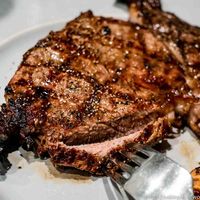 Learn How to Grill a Ribeye Steak on the Grill that is tender and juicy with these easy step-by-step photo instructions. You can be the grill master, too.