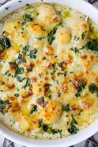 The pillowy gnocchi in this easy gnocchi gratin is transformed with a rich, velvety white cheese sauce. Serve it as an appetizer, side or main dish using fresh store-bought gnocchi for a great shortcut. 