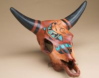 Southwestern painted accents like this pottery steer skull are fabulous for native style decor.