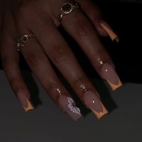 Cute orange French tips🧡 |- with white half flower golden Middle glossy nails #affiliatelink #nailart #naildesign #french #frenchnails #frenchies #Ad