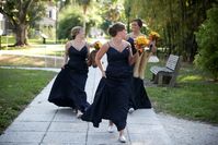 Bridesmaids Walking around the Edison Ford Estates in Toms #edisonfordweddings #toms #bridesmaidshoes