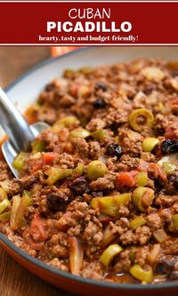 Cuban beef picadillo with green olives, raisins, and bell peppers in a hearty tomato sauce. Easy to make and budget-friendly, it's perfect for weeknight dinner or special gatherings. Serve with steamed rice and beans for the ultimate comfort food. #comfortfood #beef #stew #cubanfood #picadillo #budgetfriendly #weeknightdinner #30minutemeals #quickandeasyrecipe #recipe