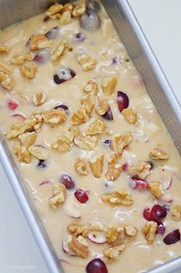 Cranberry Bread ready for the oven topped with walnuts