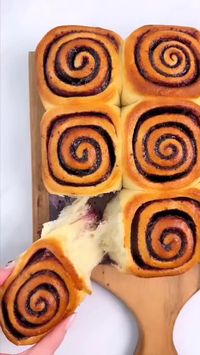 Ingredients: Tangzhong: 100g whole milk 20g bread flour Main Dough: 360g bread flour 50g sugar 7g instant dry yeast 5g salt 1 large egg 130g whole milk Prepared Tangzhong 85g softened unsalted butter Filling: 250g frozen blueberries 125g sugar 2 tsp lemon juice Cream Cheese Frosting: 100g full-fat cream cheese 25g softened unsalted butter 100g sifted powdered sugar 1/4 tsp vanilla paste A tiny pinch of salt