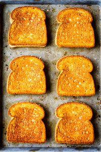 Grilled Cheese in the Oven -- this simple method makes 6 hot and fresh classic grilled cheese sandwiches per half sheet pan in just about 10 minutes... SO EASY!!! | grilled cheese in oven | baked grilled cheese | sheet pan grilled cheese | grilled cheese recipes | how to make grilled cheese in the oven #grilledcheese #sandwich #sheetpan #baked #easyrecipe #kitchenhacks #momhacks