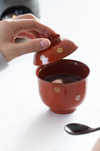 Cherry Blossom symbolizes “ inner beauty”, “elegance” and “good education” in Japan. Since lacquer ware is made of wood, it has a low heat tradition rate and keeps warm things as they are. The bowl with a lid is not only beautiful in appearance, but also has the characteristic that the soup does not cool down easily. Its timeless traditional design is suitable for long-term use, daily use or when entertaining guests. | Visit MUSUBI KILN to see other authentic Japanese tableware.