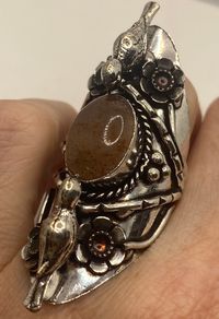 Vintage bird statement ring set with sunstone  Low content silver not sterling Over an in long  Size 8 can be resized at my jeweler for a -$20 fee All rings are shipped free in the US in a nice gift box.   Check out our over a THOUSAND great reviews Engraving is $4 per letter and is not always perfect depending on the piece. It can take a few days if the jeweler is busy. This is payable to Paypal Judithsltd@gmail.com