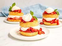 Buttery shortcake, juicy berries, and fluffy whipped cream make this a delicious way to enjoy strawberries at their peak.