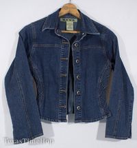 "You will love the style and hourglass fit of this smashing jean jacket. It has the iconic Zena label that was all the rage in the 80s. The tailoring is rad on this coat and it has a nice dark blue denim that's fitted in all the right places. The label reads size small and flat measurements are here to check fit. Check out the pictures! -Measurements taken laid flat (double for circumference)- Shoulder to shoulder: 14\" Chest: 17\" Shoulder to hem: 20.5\" Waist: 13\" Sleeve: 19\""