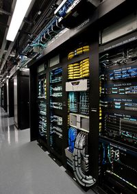 Server racks in the Brocade corporate data center in San Jose, USA. Cable management, switch, ethernet, fiber channel