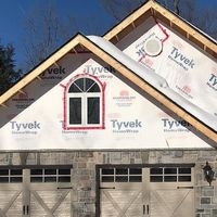 The Muskoka Stone Co. on Instagram: "We finished up some veneer stone a couple of weeks ago around this new garage. We are looking forward to revisiting in the spring to get some nice shots with the driveway paved and the area landscaped.
.
The last two pictures are a touch-up we did to the front entrance to accommodate the two coach lights that the owner had installed. Yes - they are as heavy as they look. .
.
.
#stonemasonry #mason #cottage #muskoka #granite #garage #veneerstone #coachlight #entranceway #muskokacontractor #muskokastone #garagedoors #cottagecountry"