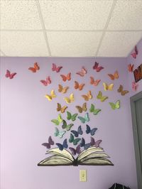 Classroom Makeover 2017. Middle school classroom library decoration idea-- using butterfly pattern for Cricut. Purple classroom.