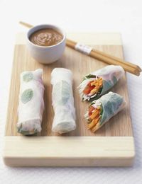 Crystal herb rice paper rolls with peanut sauce These Southeast Asian spring rolls are made with rice noodle wrappers and eaten fresh instead of deep-fried. They are called crystal rolls because the wrappers are thin and transparent – try to roll them as tight as possible without ripping. The peanut dipping sauce is quick and easy to make to serve on the side.