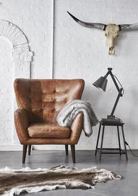 In a beautiful vintage inspired outback tan leather, the Tobin chair will add character to your home.