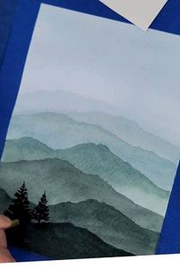 Easy watercolor tutorial of layered mountains with trees. Watercolor art for beginners, Easy watercolor painting ideas by Eliza Anderson Art.