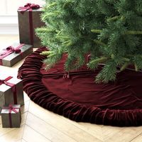 Give your Christmas tree a touch of glam for the holidays with this festive plush tree skirt. Crafted from polyester, this skirt features a circular silhouette that easily catches all those pesky pine needles - making clean-up a breeze. Its solid hue with a shiny sheen adds a jolly hint of accent, while its embroidered 6" border is the perfect plushy perch for all your Christmas presents. When it comes time to take down the tree, just throw this piece into the washing machine for easy cleaning. Mercury Row® Size: 84" W, Color: Wine Mercury Row® Hubbert Plush Velvet Christmas Textile Collection - GLOBAL in Wine | Size 84" W | Birch Lane