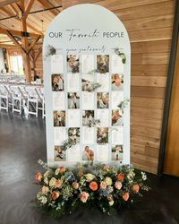 My arch floral seating chart with our engagement pictures turned out better than I imagined!!