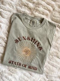 Show off your rays of sunshine with our Sunshine State of Mind Crewneck Sweatshirt! PLEASE BE SURE TO INPUT YOUR CORRECT SIZE/COLOR + SHIPPING ADDRESS. We will not be responsible if it is incorrect! SHIPS OUT IN 1-2 WEEKS WE WILL NOT BE RESPONSIBLE FOR EXTRA SHIPPING FEES (VARIES IN COUNTRIES) AFTER ORDERING, YOU WILL RECEIVE AN AUTOMATIC ORDER CONFIRMATION EMAIL. TO GET THIS, MAKE SURE YOU INPUT YOUR EMAIL CORRECTLY DURING CHECKOUT Model is wearing small Garment Information: 50% Cotton; 50% Pol