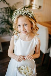 Flowergirl Gypsophila flower crown and basket with rose petal confetti.  Wedding at The Lion Inn, Boreham. Essex.  

Photography credit: https://www.pureimagephotography.co.uk