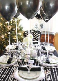 black and white table decorations adult fashion show. | 10 Chic Ideas for Winter Party Décor | Brit + Co.