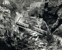 Metal bridge built at Gaviota pass at 1890.  This photo is later with a car on it.