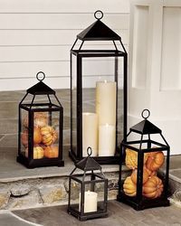 Fall Decor - Front Porch Lanterns Filled with Mini Pumpkins and Gourds.