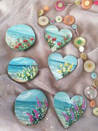 Introducing our cute original hand painted  floral wooden heart and wooden round fridge magnets. The magnets are all inspired from the beautiful coastal shores and landscapes of Devon and Cornwall ,carefully painted to create these miniature artworks with lovely flowers. Item size 5cm x 5cm  :)  sizes may vary slightly  This item is perfect for a present or a treat for yourself. All our artworks are hand painted with various techniques and skills developed over years to create unique textures an