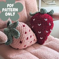 Crochet Strawberry Pillow Pattern PDF PATTERN ONLY - THIS IS NOT A PHYSICAL PRODUCT This is a listing for a PDF download for a pattern created by me.  (You will not receive a physical plushie or pillow). This pattern is written in English and uses US terminology. If you would like the free version of this pattern then head over to my instagram @avaloncrochets and I will have it either pinned or highlighted.  Stitches and abbreviations used: ST = stitch, CH = chain, SC = single crochet, HDC = hal